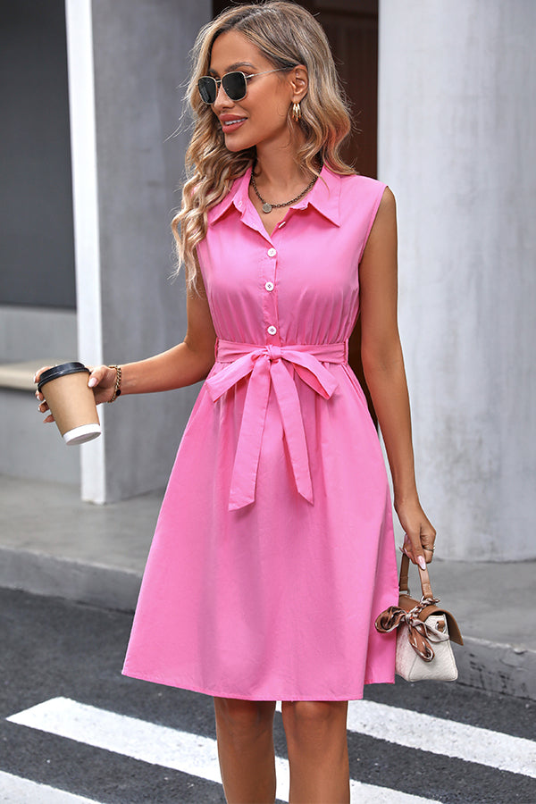 Dress with button placket and slit at the neckline