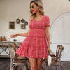 Dress with floral print, V-neckline and ruffles