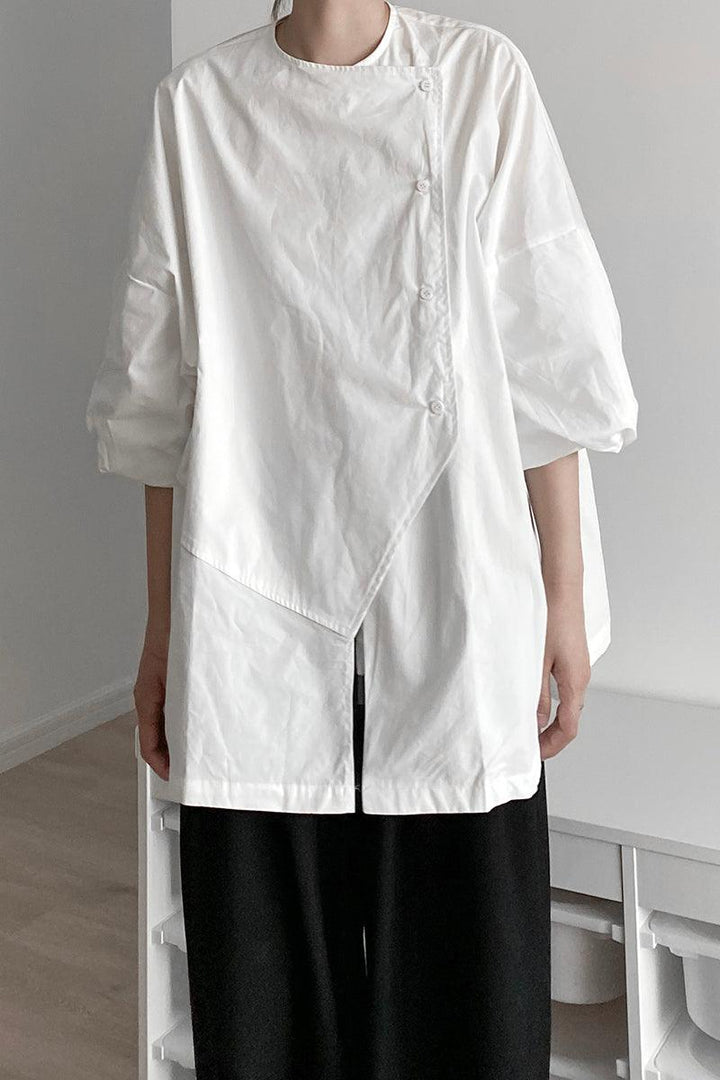 Shirt with irregular button placket