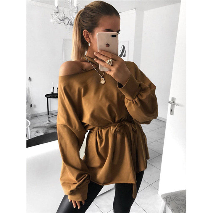 Modern long-sleeved blouse with slanted shoulder