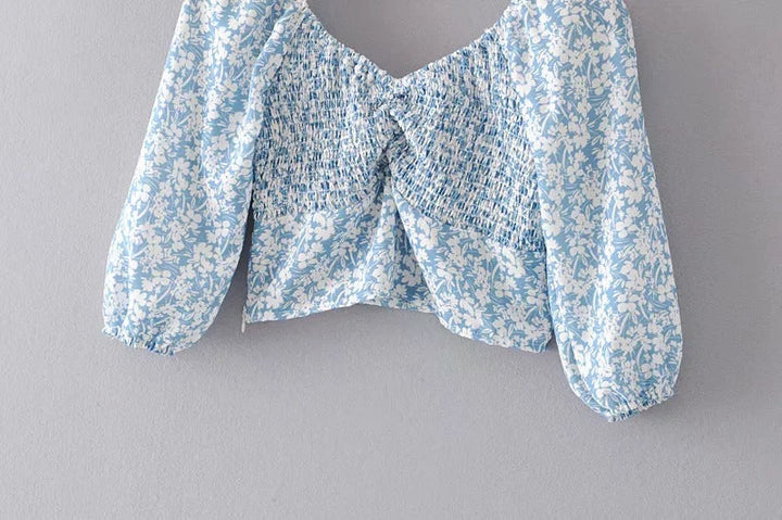 Modern short-sleeved blouse with printed collar