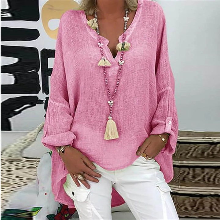 Pink blouse with elegant O-neckline