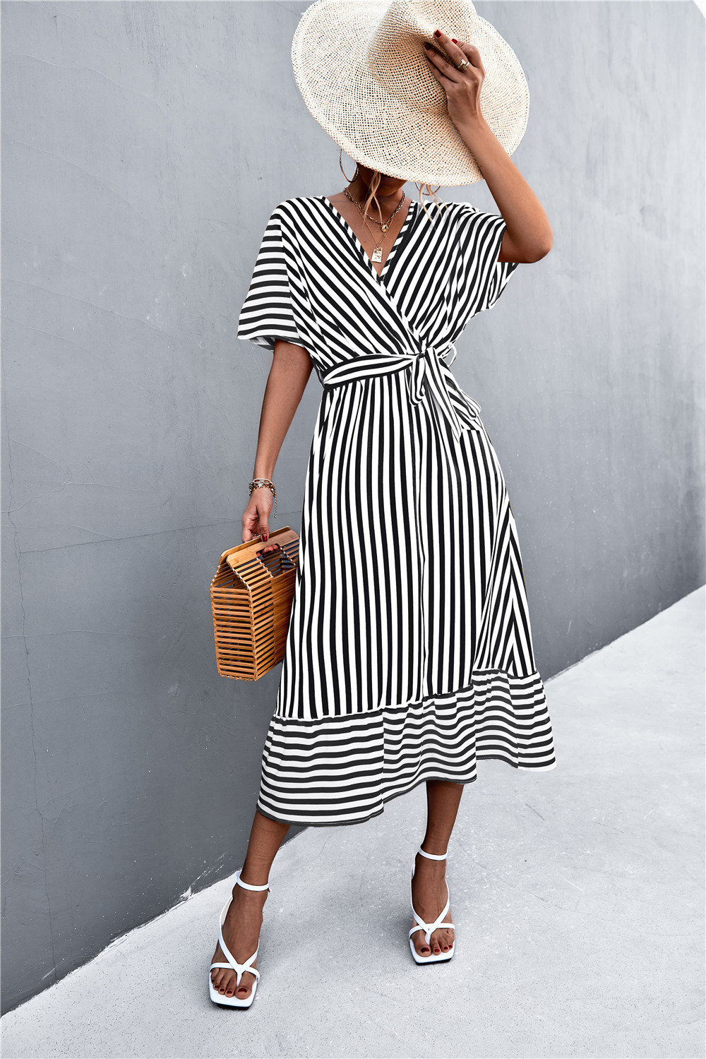 Striped long dress with wrap pattern