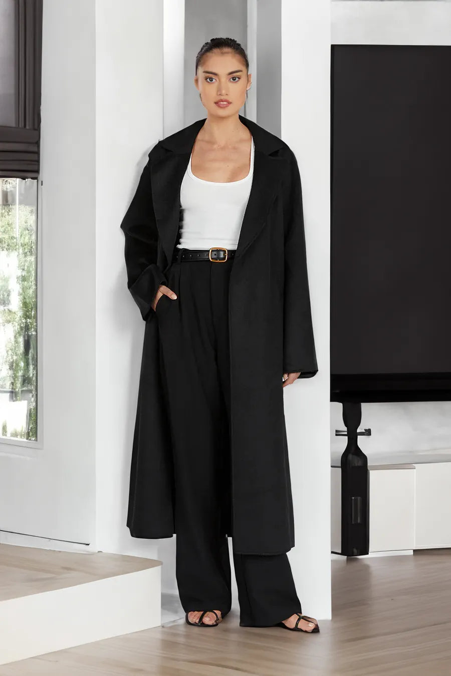 Stylish long women's trench coat in oversize style