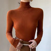 Plain-coloured long-sleeved knitted top with high neckline