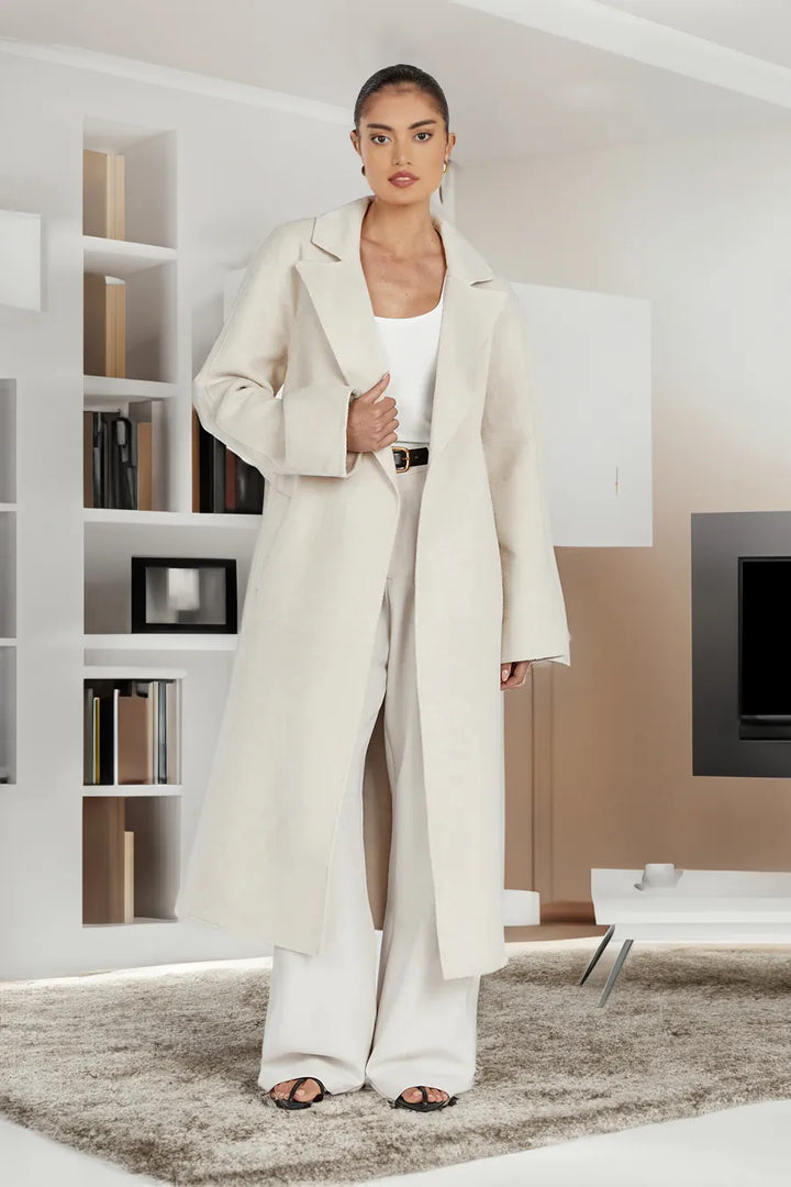 Stylish long women's trench coat in oversize style