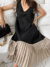 Pleated dress with V-neck and contrasting inserts