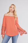 Off-the-shoulder lace blouse