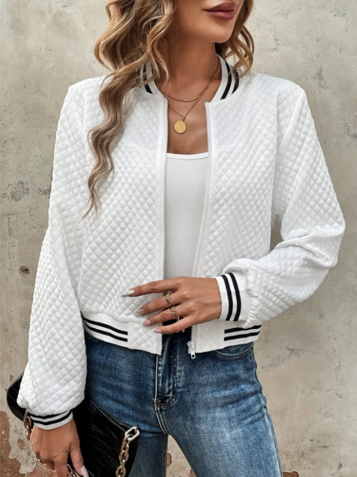 Casual bomber jacket with a light quilted pattern and striped details