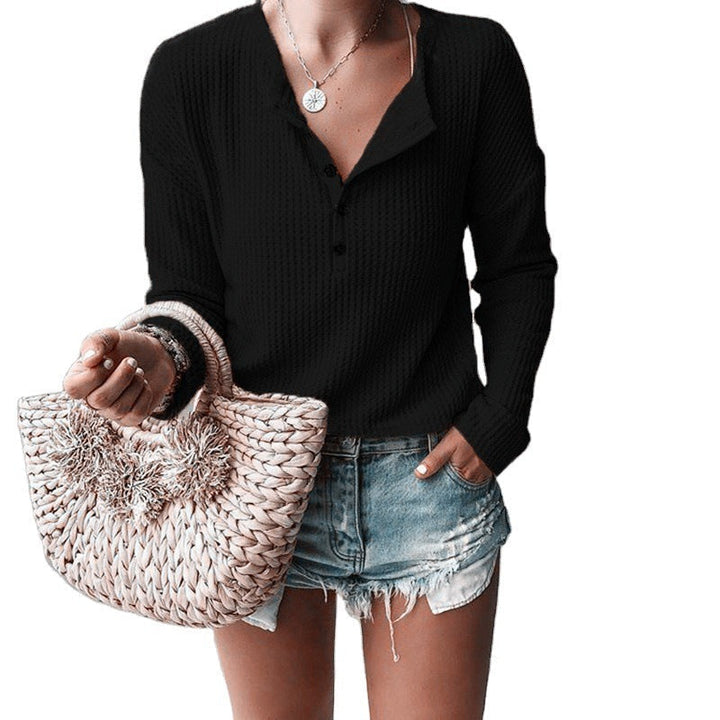 Buttoned blouse with V-neck and long sleeves