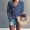 Button-up blouse with V-neck and long sleeves