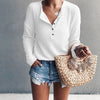 Button-up blouse with V-neck and long sleeves