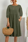 Casual mid-length dress with 3/4-length sleeves