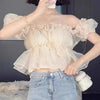 Transparent organza blouse with ruffled sleeves