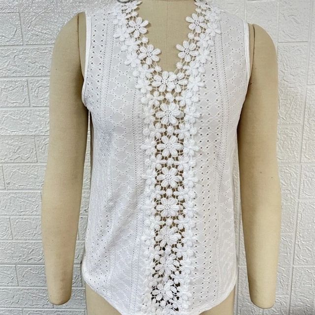 Sleeveless blouse with lace overlay