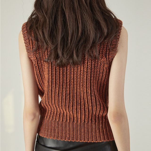 Knitted waistcoat with chain embellishment