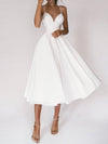 The elegant strap dress with V-neckline