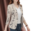 Women's blazer with floral pattern and ankle button fastening