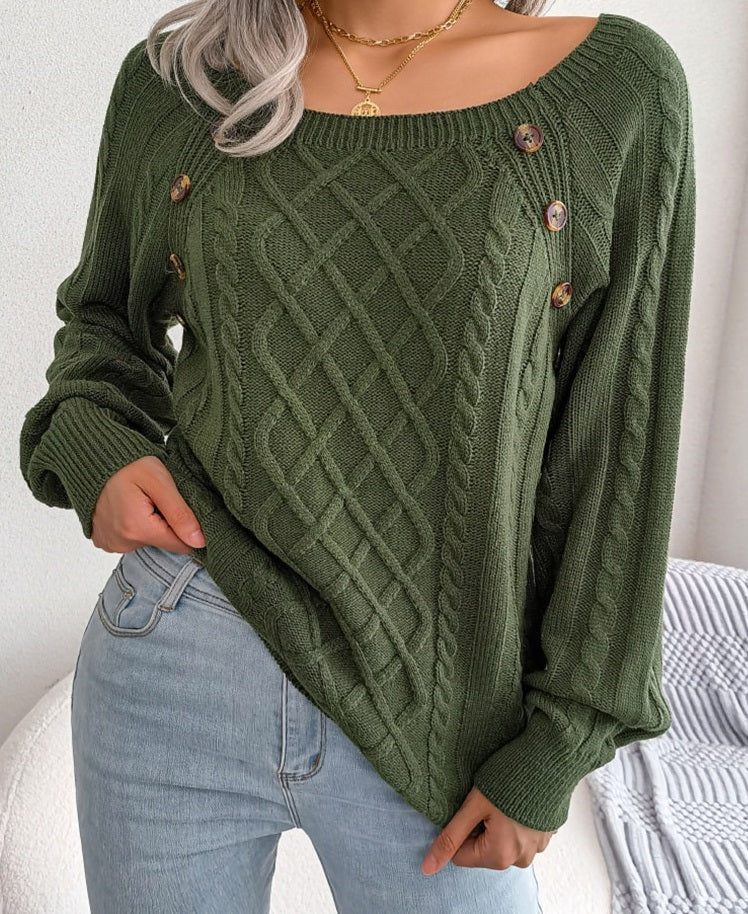 Knitted elegant women's jumper with buttons and ribbed motif