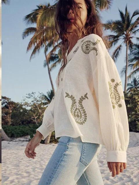 Blouse with lantern sleeves and embroidery