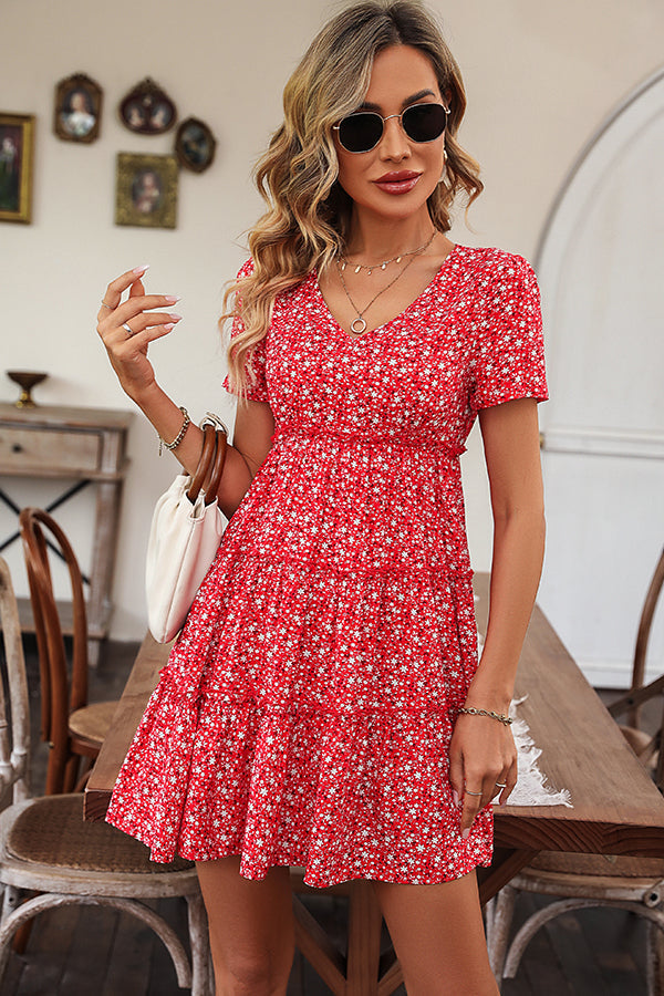 Dress with floral print, V-neckline and ruffles