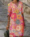 Knee-length printed dress with half sleeves