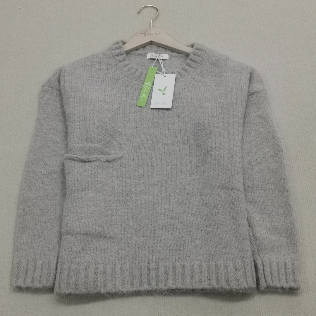 Oversized knitted jumper with pocket