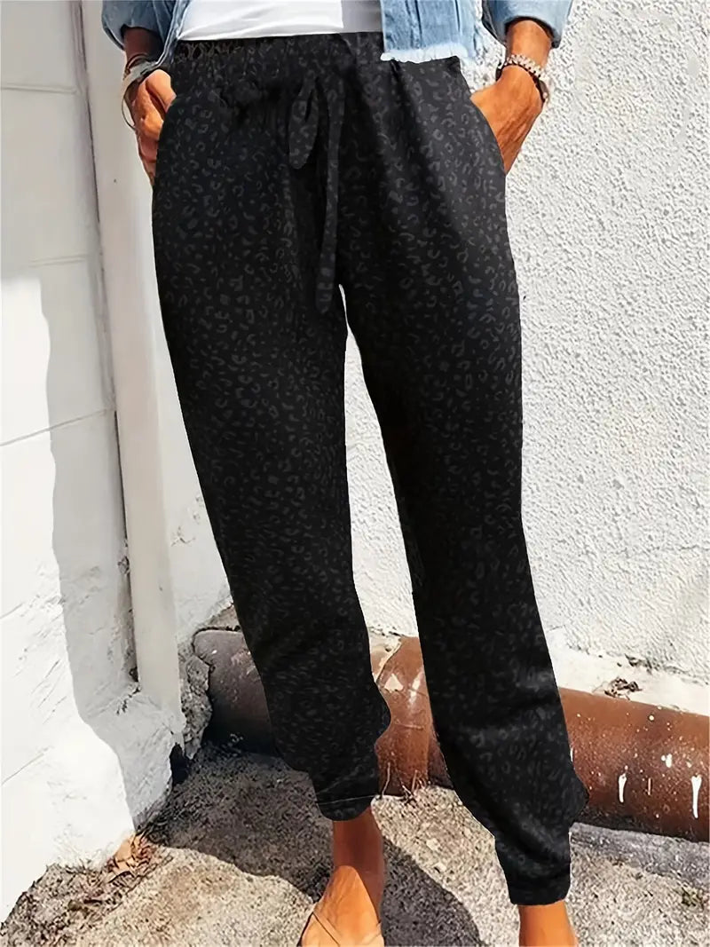 Casual jogging trousers with leopard print and fixed bottom