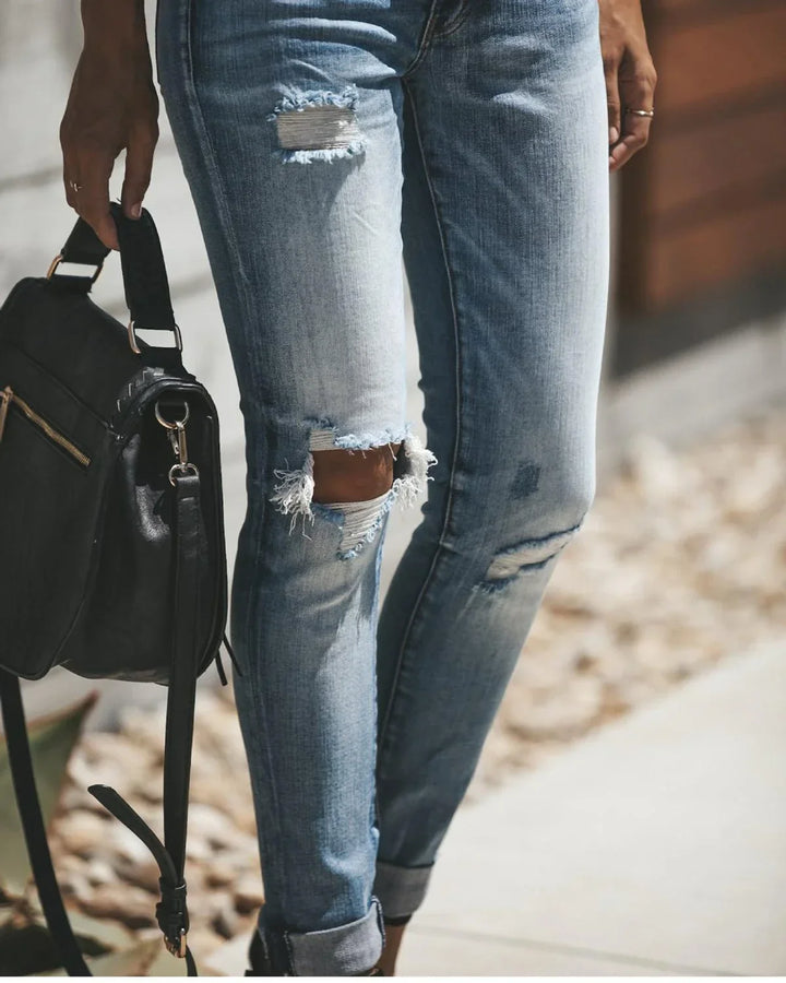 Light blue ripped jeans