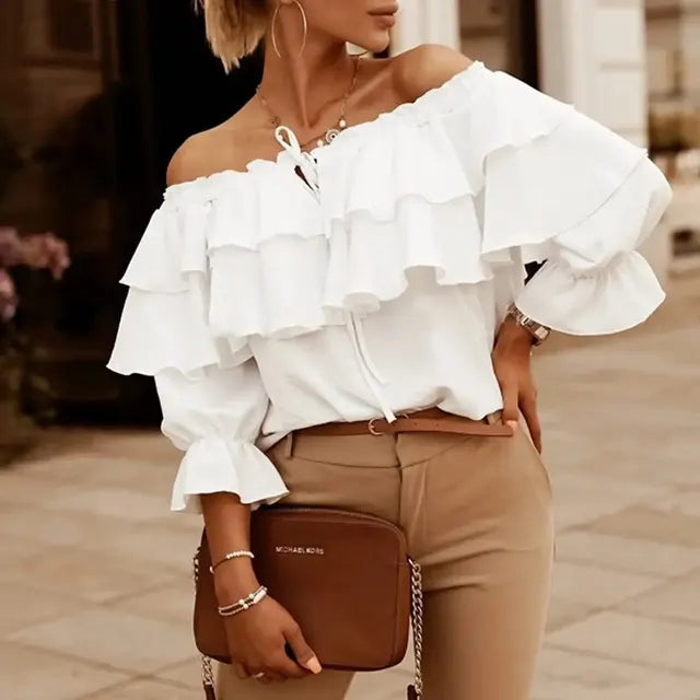 Women's blouse in loose chiffon with off-the-shoulder and flounce edge, elasticated shoulder strap