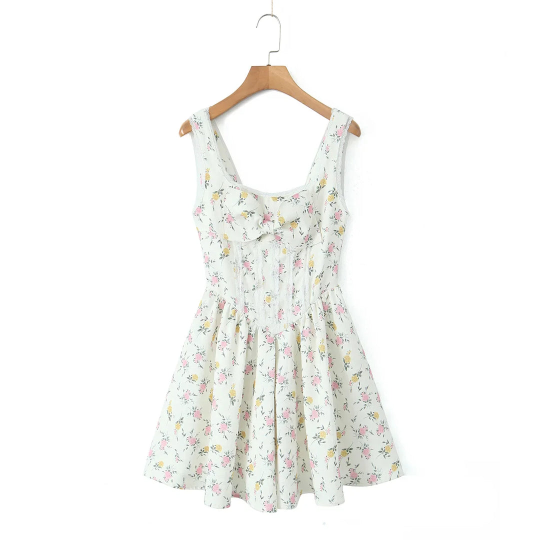 Summer dress with floral pattern and bow detail