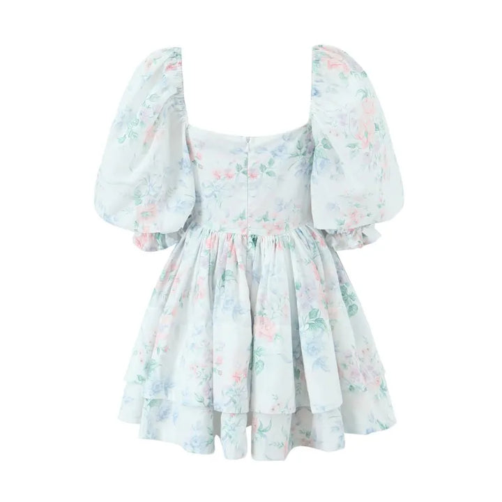 Pastel-coloured dress with floral pattern