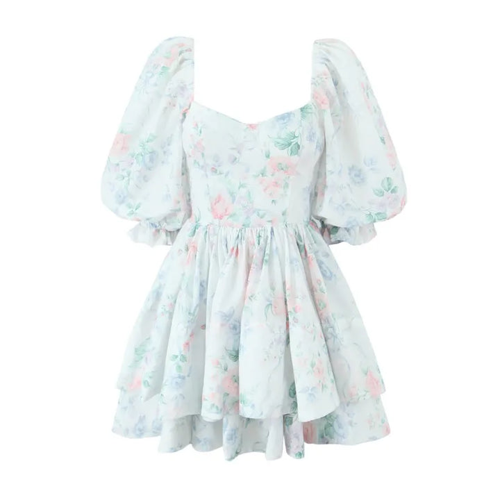 Pastel-coloured dress with floral pattern