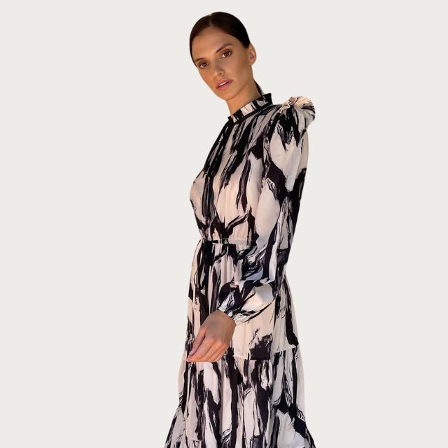 Midi dress with abstract print and tiered skirt