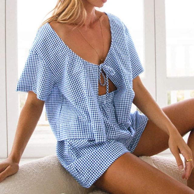 Gingham romper with keyhole neckline and bow detail