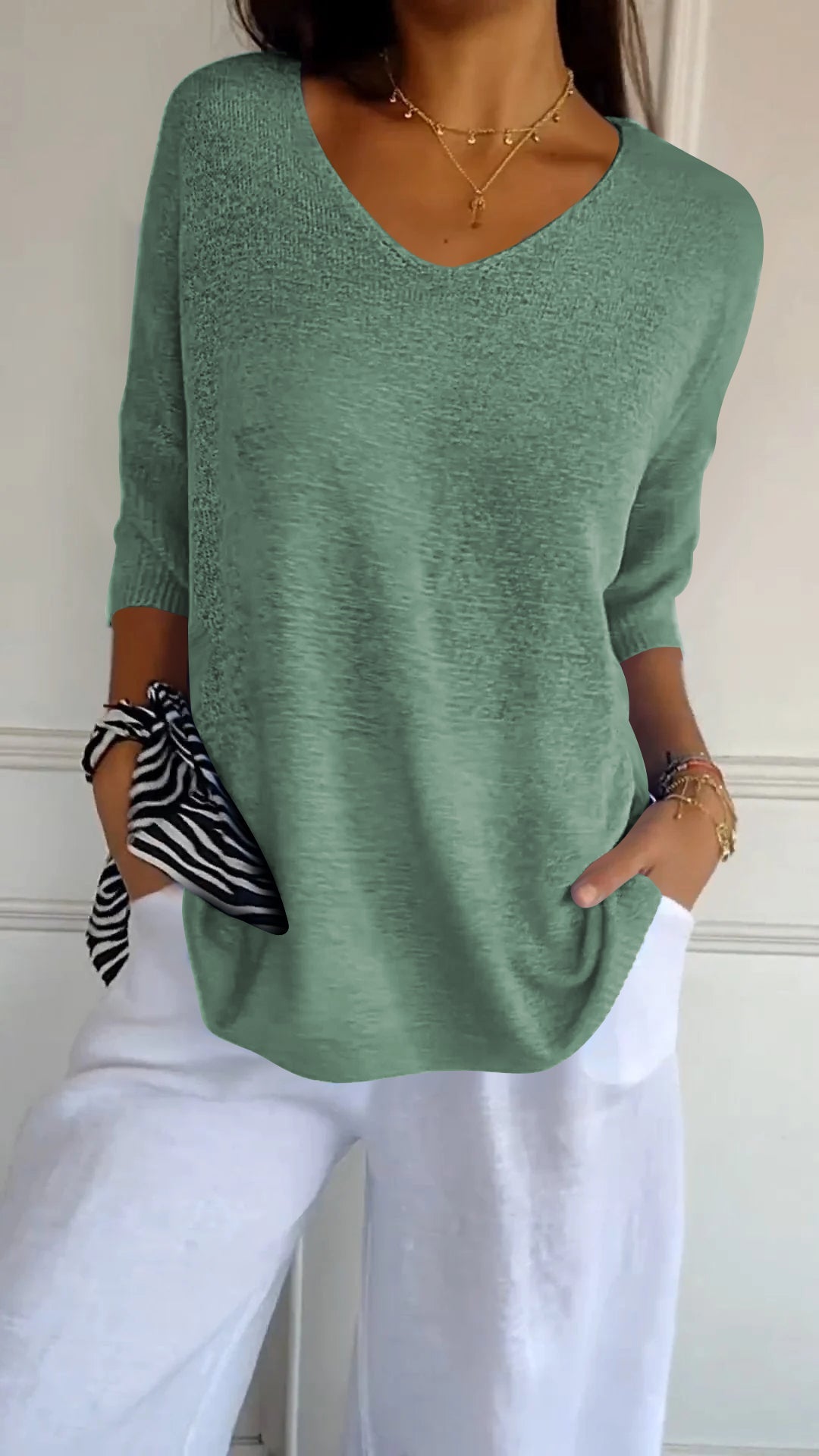 Knitted top with V-neck