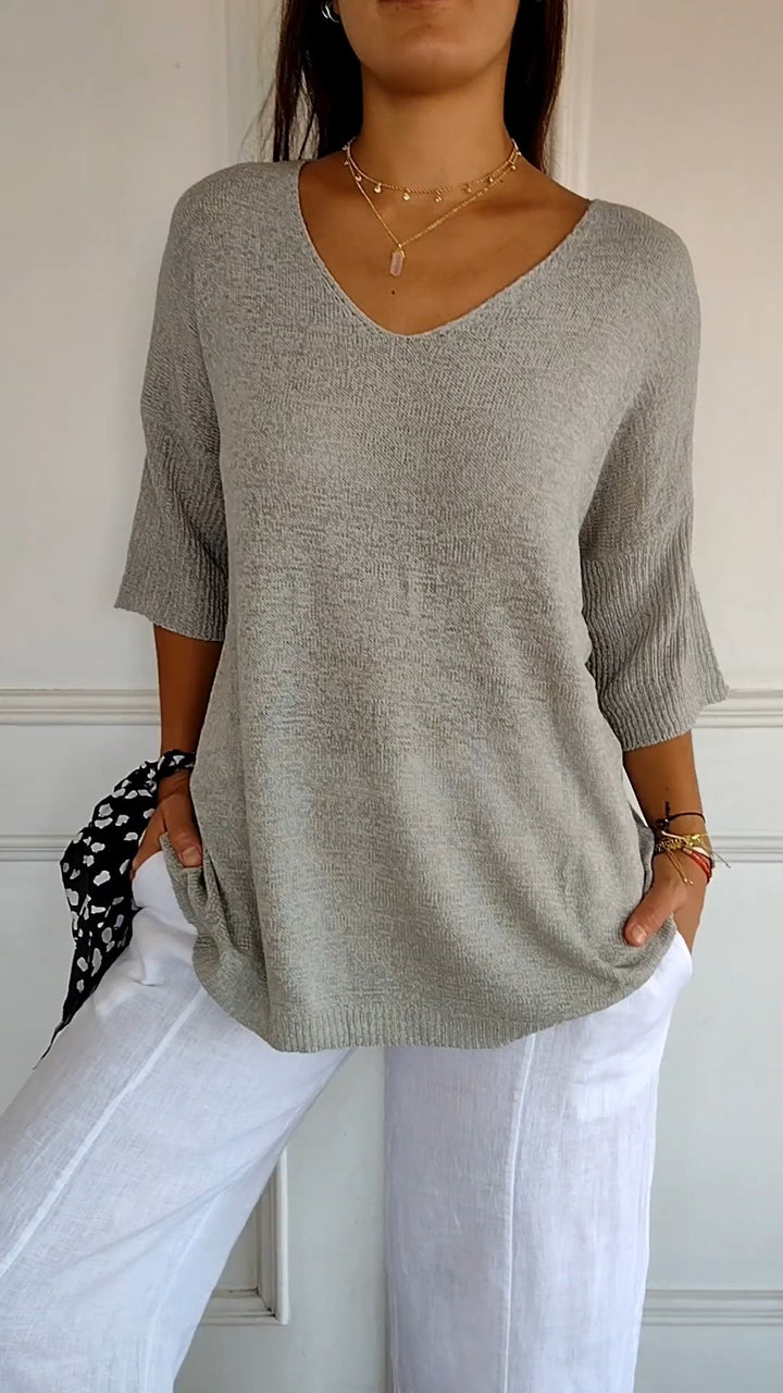 Knitted top with V-neckline