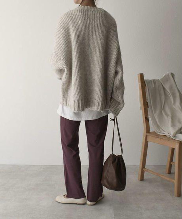 Oversized jumper with ivory-coloured pocket front