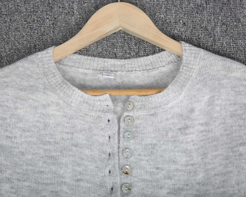 Classic grey jumper with button fastening