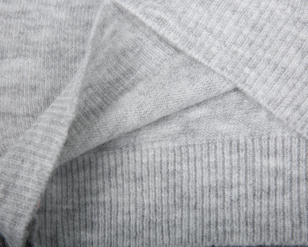 Classic grey jumper with button fastening