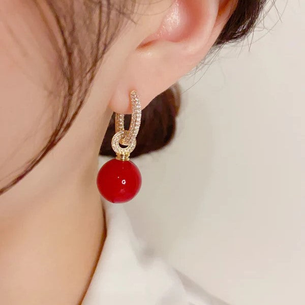 Pavé hoop earrings with ball pendants