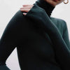 Plain-coloured long-sleeved knitted top with high neckline