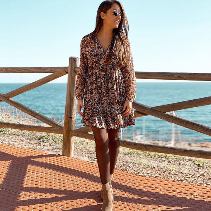 Graceful long-sleeved pleated dress with bohemian print