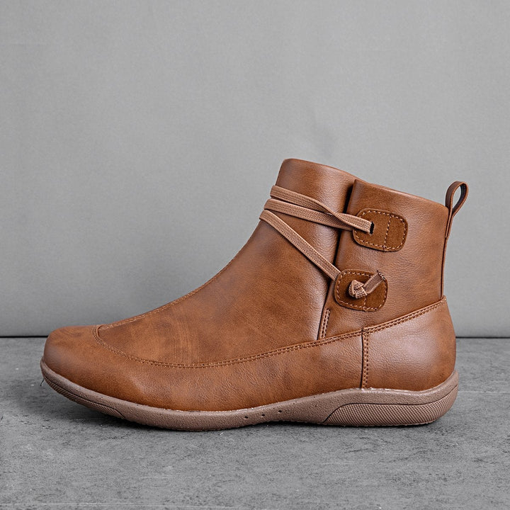 Ankle boot with strap