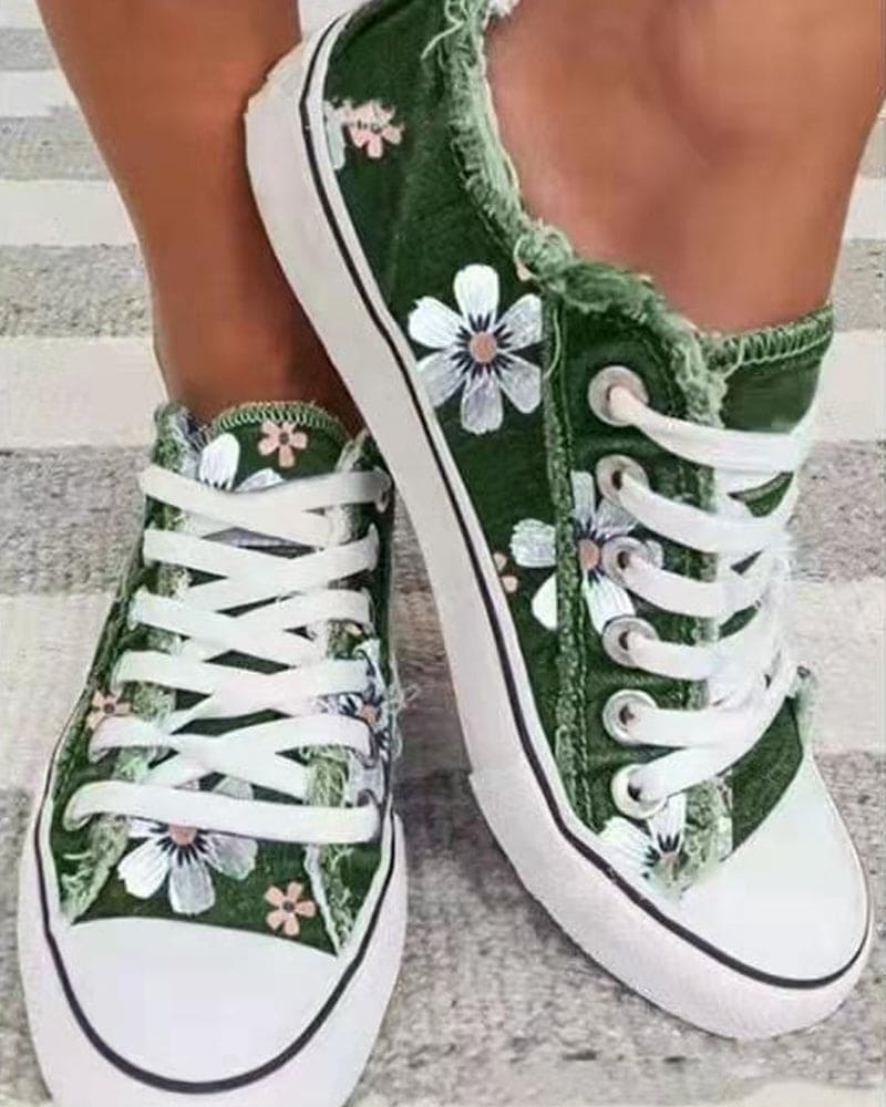 Denim sneaker with flowers