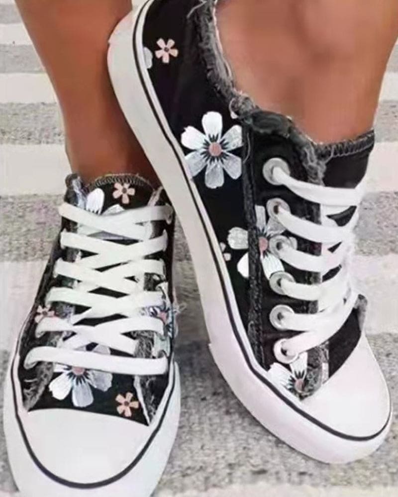 Denim sneaker with flowers