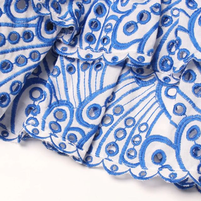 Gathered bandeau mini dress with blue paisley pattern