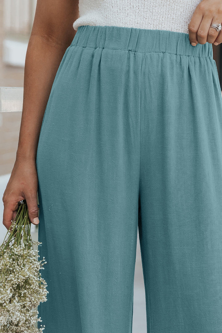 Gathered trousers with high waist