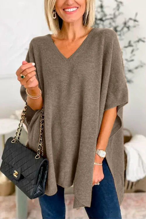 Jumper with irregular hem and V-neckline