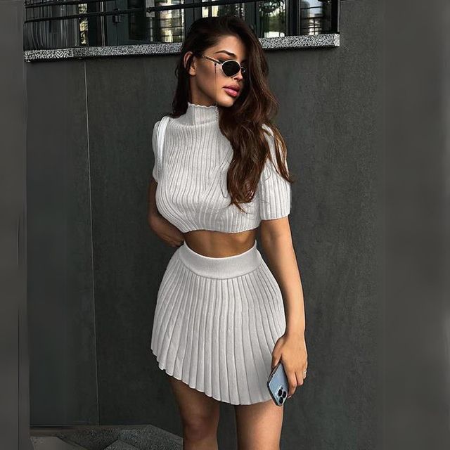 Ribbed crop top with matching pleated skirt